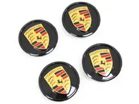 Copricerchi in colore nero (lucido) con stemma Porsche colorato per Porsche Taycan / Panamera - 9J1073002