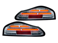 Indicatore di direzione posteriore a LED, contorno nero / lente trasparente. Porsche 986 Boxster - 98663144504, 98663144604, 00004490067 - EU-74-BOX-R-16
