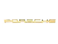 Targhetta posteriore 'PORSCHE', colore oro. Porsche 356 - 64455930106