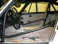 Roll-bar a 6 punti imbullonato con barre porta singola, con tetto apribile. Porche 964