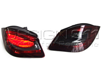 Intermitentes Traseros LED Ahumado Oscuro / Lente Rojo & Base Cuña Central Negra Porsche 987 MKII / 987C MKII - 98763142703, 98763142803